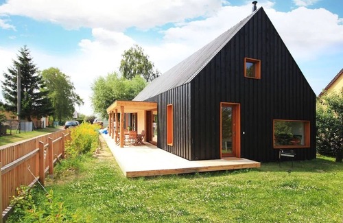 Loissin House | Modern wooden house on the Bodden with two apartments that can be combined