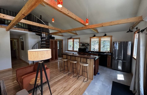 Isle of Springs Cottage | Modern woodland privacy with ocean, trails, and lobster all in walking distance.