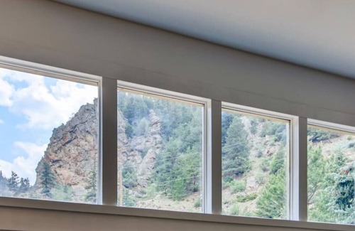 Idaho Springs Condo | Modern Work & Play WATERFRONT Condo right on the creek