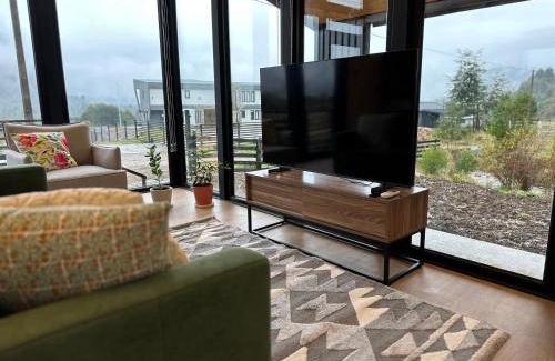Puerto Aysen House | Moderna y acogedora casa estilo galpón