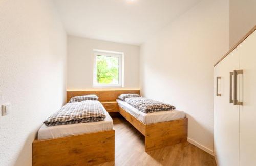 Bad Zwischenahn Apartment | Moderne Ferienwohnung mit SUPs, Balkon und Parkplatz