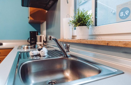 Kolitzheim Apartment | Moderne Ferienwohnung (80qm) mit gemütlicher Sitzecke im Garten