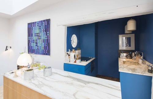 Quartier de Rochechouart Apartment | Modernist Style by the Folies Bergère, by Veeve