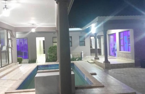 Kadoma Apartment | Modernly Furnished Standard Room With Queen bed - 2220
