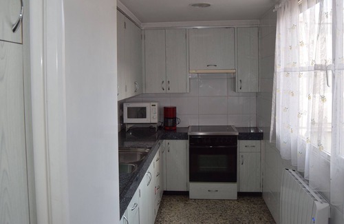 Igualada Condo | modest apartment with terrace