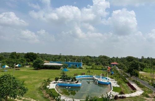 Modhera Resort | MODHERA SUNRISE RESORT - Tents Bhungas Jungle Restaurants & Candlelight Dining
