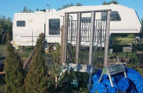 Florence House | Montana Mountain Memories- RV in Orchard by Trout Pond