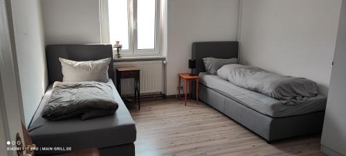 Veitshoechheim Apartment | Monteurwohnung bei Würzburg bis 6 Personen mit gratis Parklätzen und Grill und WLAN 3x Schlafzimmer und Grill