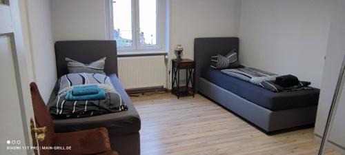Veitshoechheim Apartment | Monteurwohnung bei Würzburg bis 6 Personen mit gratis Parklätzen und Grill und WLAN 3x Schlafzimmer und Grill