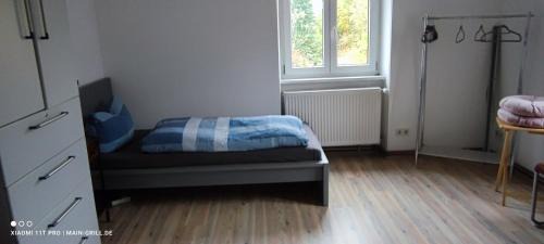 Veitshoechheim Apartment | Monteurwohnung bei Würzburg bis 6 Personen mit gratis Parklätzen und Grill und WLAN 3x Schlafzimmer und Grill