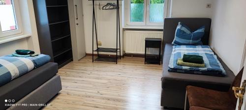 Veitshoechheim Apartment | Monteurwohnung bei Würzburg bis 6 Personen mit gratis Parklätzen und Grill und WLAN 3x Schlafzimmer und Grill