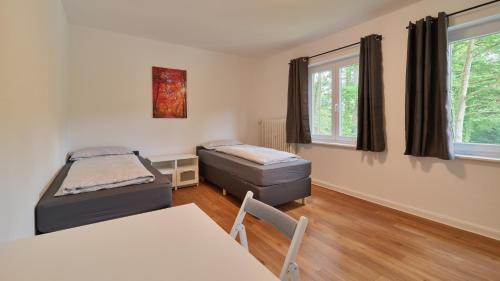 Ehrang-Quint Apartment | Monteurwohnungen in Trier - Parkplatz - Einzelbetten - Waschmaschine und Trockner