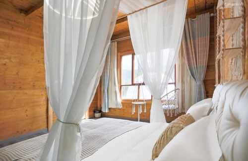 Xinyuan Bed & Breakfast | Montis Prospectu Tabernae Lignea