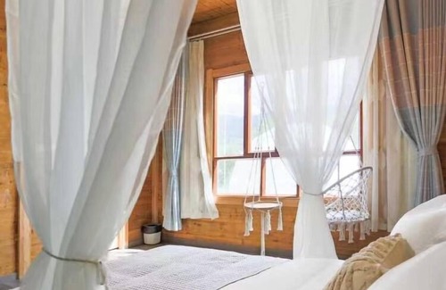 Xinyuan Bed & Breakfast | Montis Prospectu Tabernae Lignea