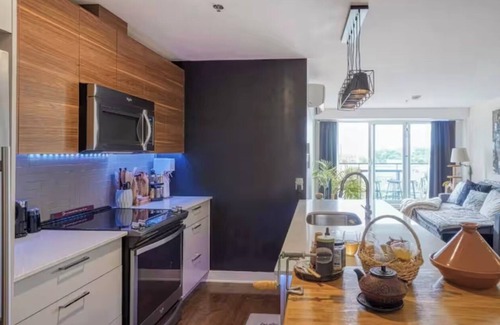 Ahuntsic-Cartierville Apartment | Montreal Skyline Sanctuary – Chic & Cozy Living