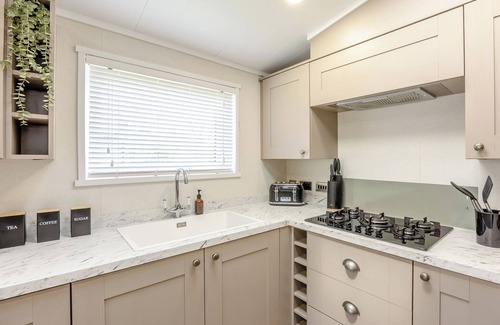 Woodhall Spa Ski Chalet | Monument Lakeside Lodge Pet Friendly