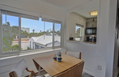 Treasure Island Condo | “Moonlight” 1BR Upstairs w/Courtyard View, Walk to Beach & Shops, King Bed, Full Kitchen