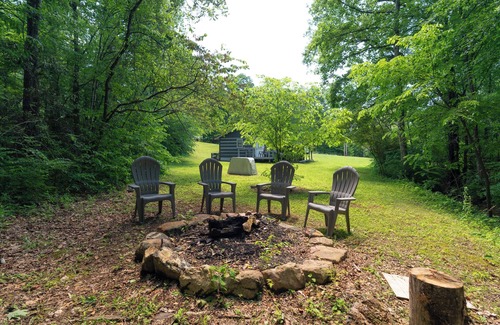 Newport Cabin | Moonshine Cabin with a nice yard on the creek in the shadows of the Smokies