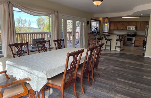 Cohoe Hotel | Moose Is Inn Room 2- Two double beds with a balcony view