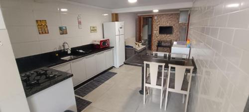 Carianos Apartment | Moradas Desterro, próximo ao aeroporto 01