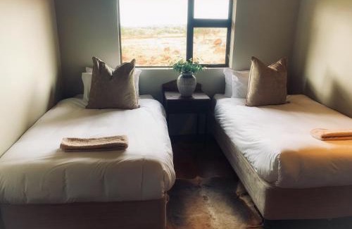 Dr Ruth Segomotsi Mompati District Municipality Cabin | Morakane Safari Lodge