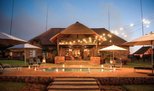 Dr Ruth Segomotsi Mompati District Municipality Cabin | Morakane Safari Lodge