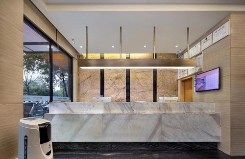 Louxing District Hotel | Morninginn, Humanities and Technology College