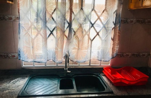 Madina House | Moroccan Tile House in Estate by American House Accra