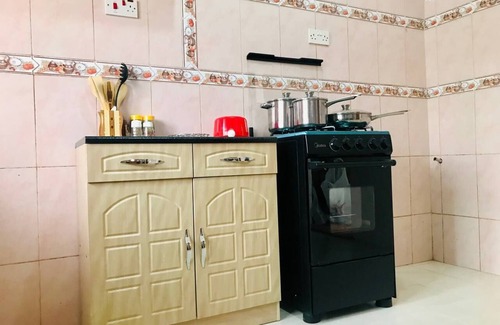 Madina House | Moroccan Tile House in Estate by American House Accra