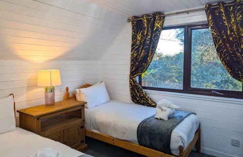 Almondbank Ski Chalet | Morrigan 7-Hot Tub-Pet Friendly-Boutique-Perthshire-Families