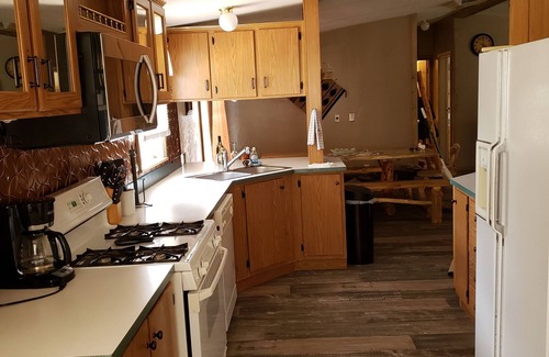 Lewis Cabin | MOUNTAIN BIKE, SIDE BY SIDE OR BRING YOUR HORSE RIDE RIGHT ON TO NATIONAL FOREST