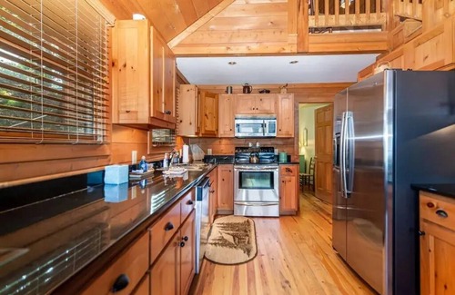 Walnut Mountain Cabin | Mountain top cabin with big views, a relaxing hot tub and 2 gas fireplaces.