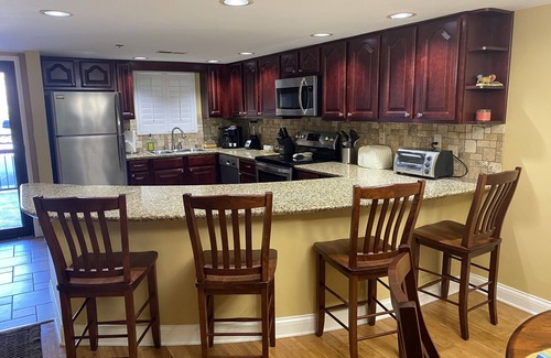 Gatlinburg Condo | MOUNTAIN VIBES 2BR 1ST FLOOR CONDO ON ROARING FORK CREEK-UNLOAD WALK TO DOWNTOWN