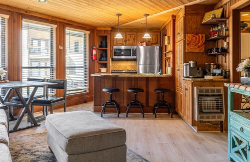Angel Fire Condo | Mountain-view condo with pool, fireplace, gym, games & balcony