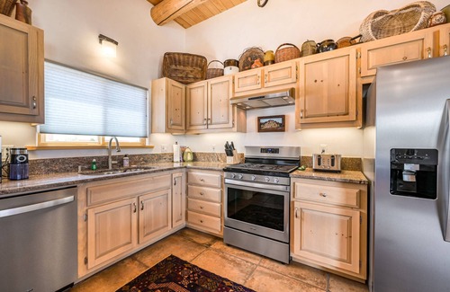 Taos House | Mountain view home with a fireplace, hot tub, washer/dryer & gas grill