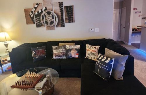 Executive Park Apartment | Movie Themed Family Get-a-way! Sleeps 7 Popcorn, Snacks, and Drinks, Included - Pools are still OPEN!