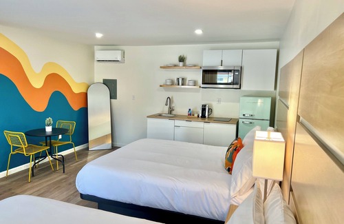 Starkville Hotel | MSU Boutique Hotel w Kitchenette, Escape Ordinary—Stay Far Out