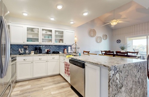 Point Venture House | Multiple level townhouse with patio, great views, playground & Wifi