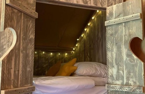 Foxley Apartment | Muntjac is a wonderful safari tent situated in rural Norfolk with ample space