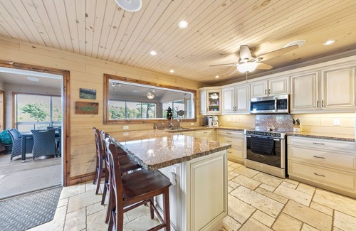 Big Chute Cottage | Muskoa Lake retreat, 5 bedrooms, 4 season with hot tub, fire pit, fireplace