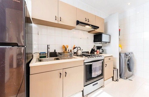 Roma Norte Condo | Mustard & Pink City Pad, Walk to Medellin Market