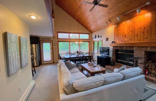 Bretton Woods Villa | MWP59 Mount Wash Place Townhome fireplace large deck yard