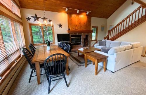 Bretton Woods Villa | MWP59 Mount Wash Place Townhome fireplace large deck yard