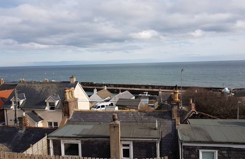Johnshaven Cottage | Myrtle Cottage set in an elevated location with spectacular sea views.