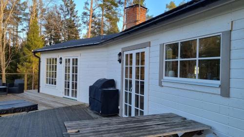 Bergshamra House | Mysig stuga med sjöutsikt
