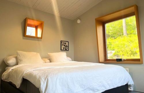 Ytterbystrand House | Mysigt sommarhus med havsutsikt och bastu