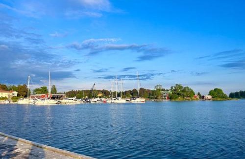 Ytterbystrand House | Mysigt sommarhus med havsutsikt och bastu