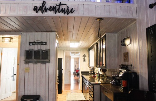 Raccoon Ridge Cabin | Mystical River Cabin | Themed Rooms & Hot Tub