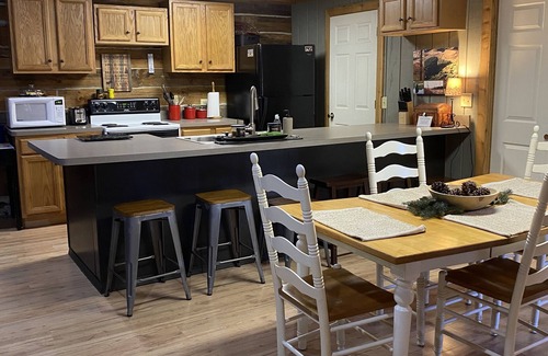 New Rumley Cabin | n Rustic Cabin Retreat on 120 Acres with Private Lake, Wildlife, and Fireplace.