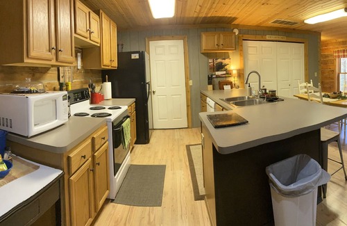 New Rumley Cabin | n Rustic Cabin Retreat on 120 Acres with Private Lake, Wildlife, and Fireplace.